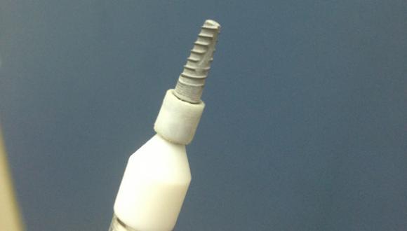 Commercial dental implant coated with hydroxyapatite by electrodeposition (Prof. Noam Eliaz)